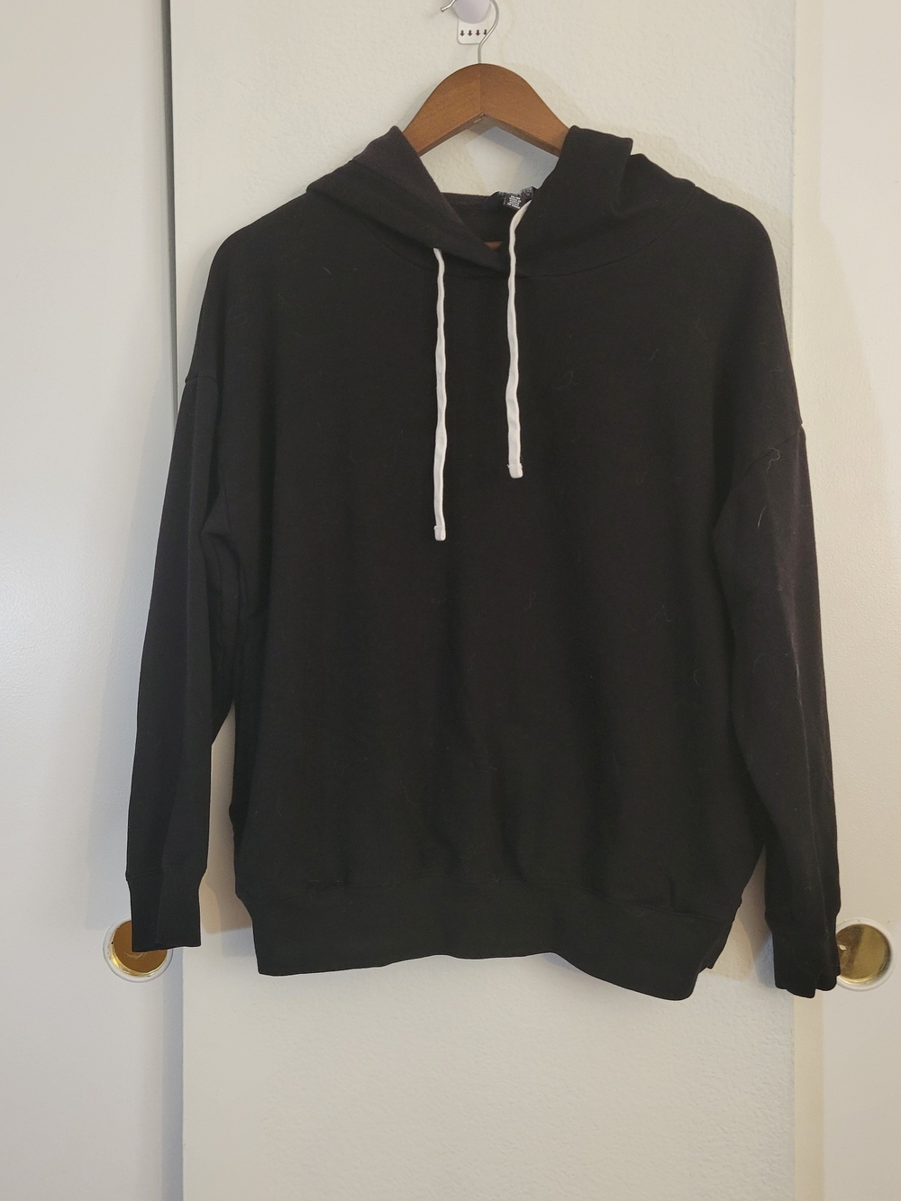 Buffalo David Bitton Black Hoodie with White Drawstrings and Pocktes.